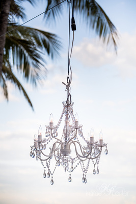 Crystal chandelier hanging above the beach