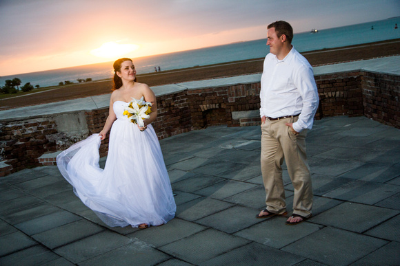 Bride swishes dress on top of Fort Zachary Taylor