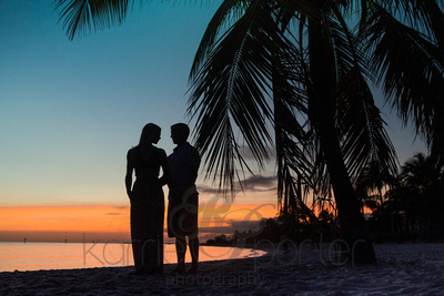 Sunset behind silhouette couple in Key West
