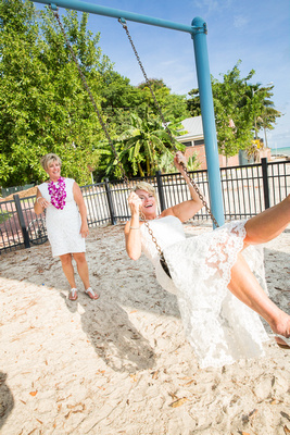 Bride on swing at Higgs Beach park